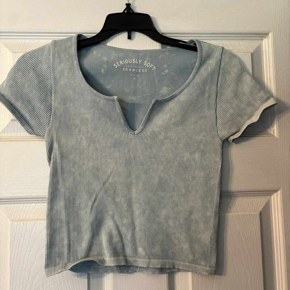 Light blue with speckled white Aeropostale crop top, women’s medium, tight fit.